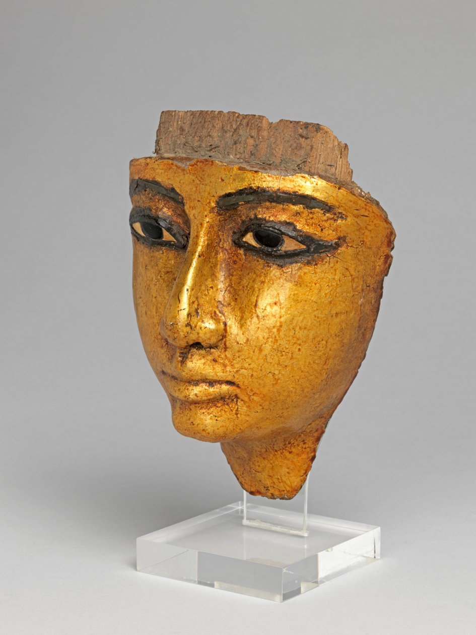 Rostro de un ataúd, con ojos y cejas incrustados, dorado de Egyptian 20th Dynasty