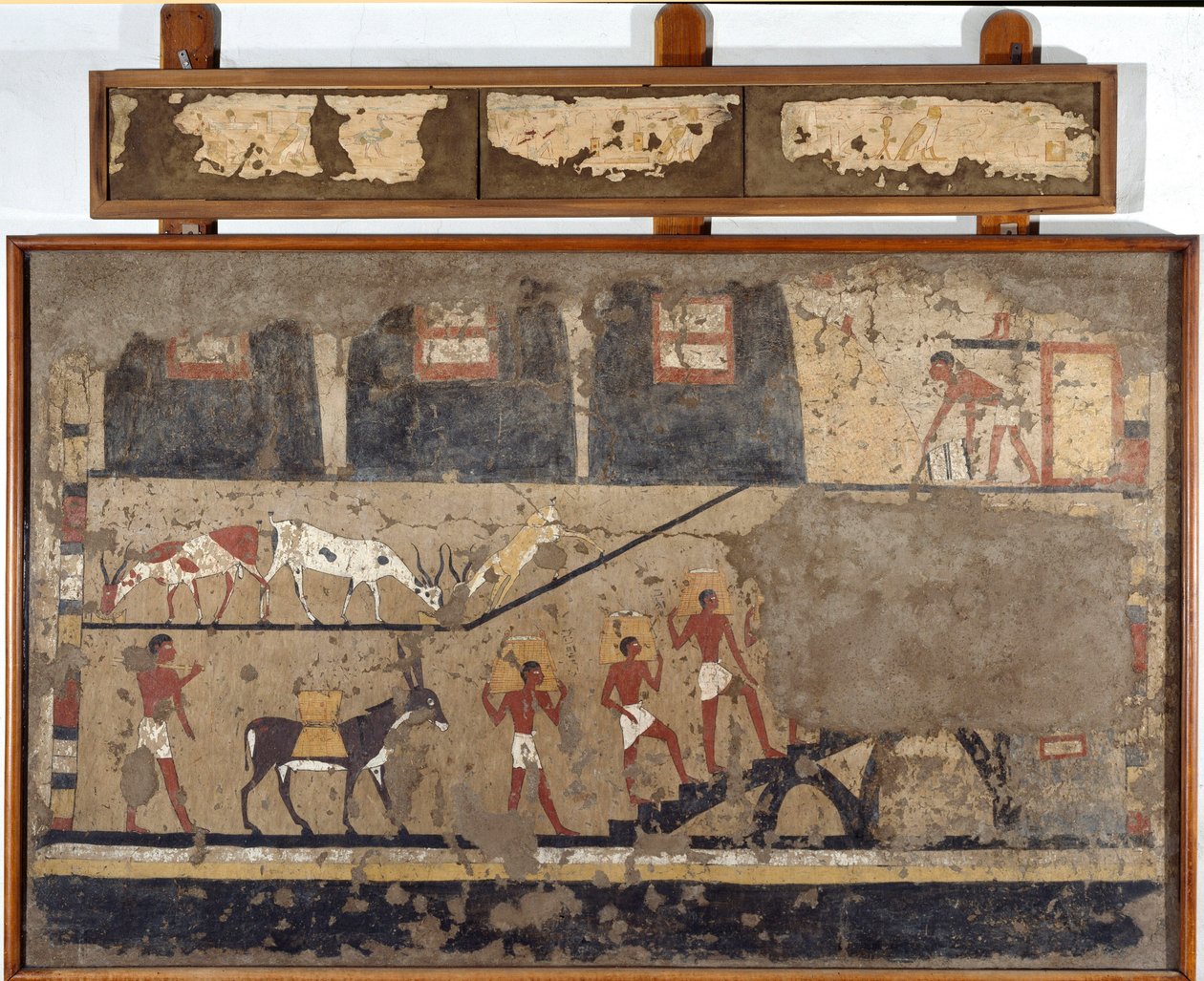 Antigüedad egipcia: el transporte de trigo en la espalda de mulas y en la espalda de hombres. Detrempe sobre arcilla y paja de la tumba del General y Canciller del Rey Iti en El Ghebelen cerca de Luxor. 2200-2000 a.C. Turín, museo egipcio de Egyptian Egyptian