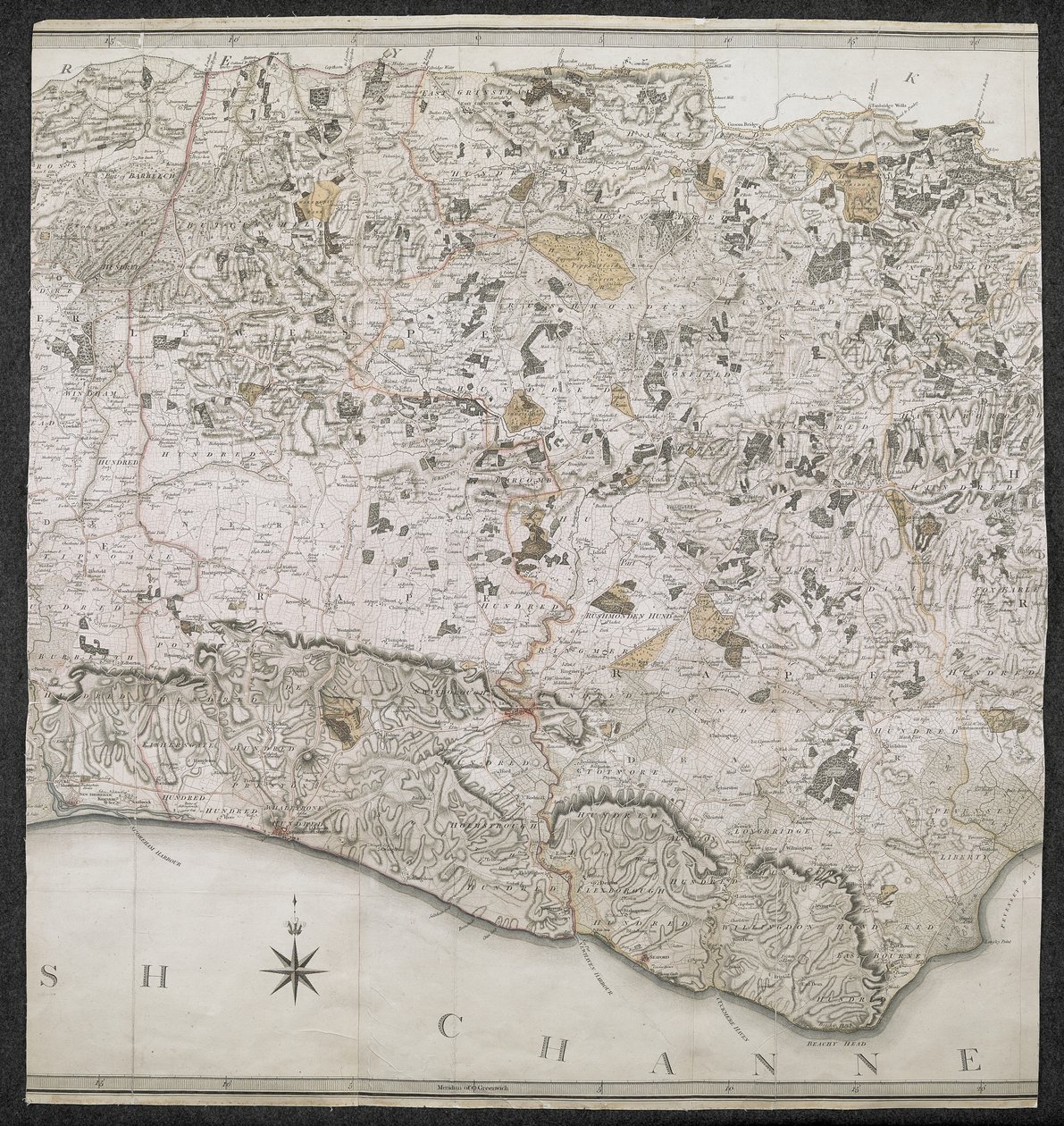 Un mapa topográfico del condado de Sussex, dividido en violaciones, decanatos y cientos. Planificado a partir de una encuesta real por una escala de una pulgada a una milla terrestre de English School