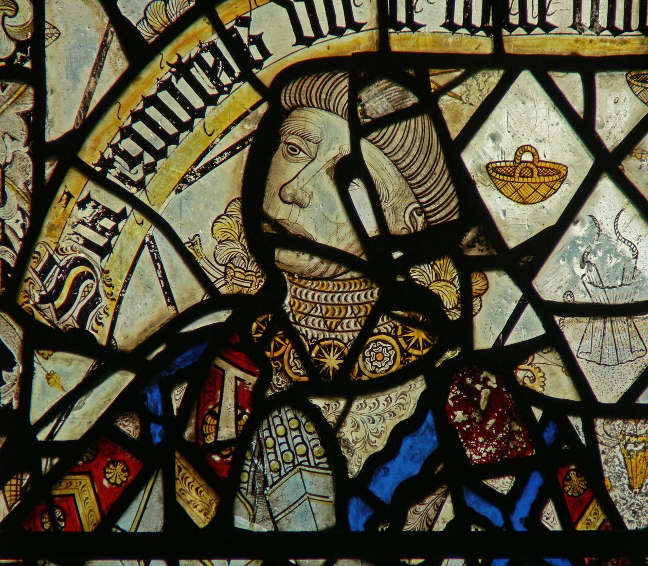 Detalle de una ventana que representa al donante (vidriera) (detalle) de English School