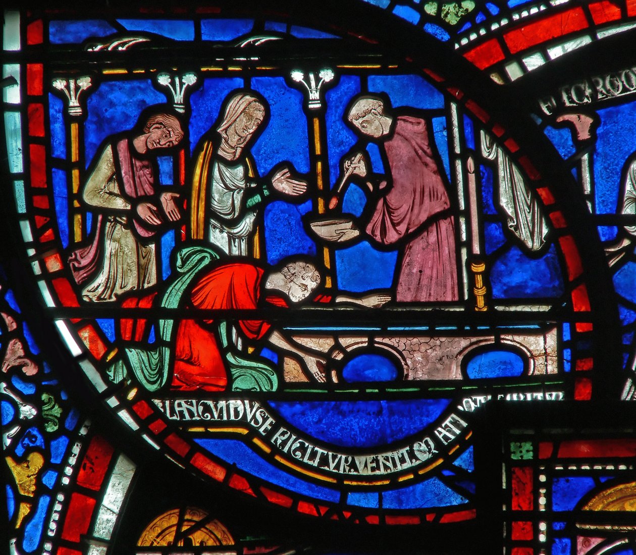 (detalle) de la Ventana del Milagro que representa la historia de Ricardo Sunieve de English School