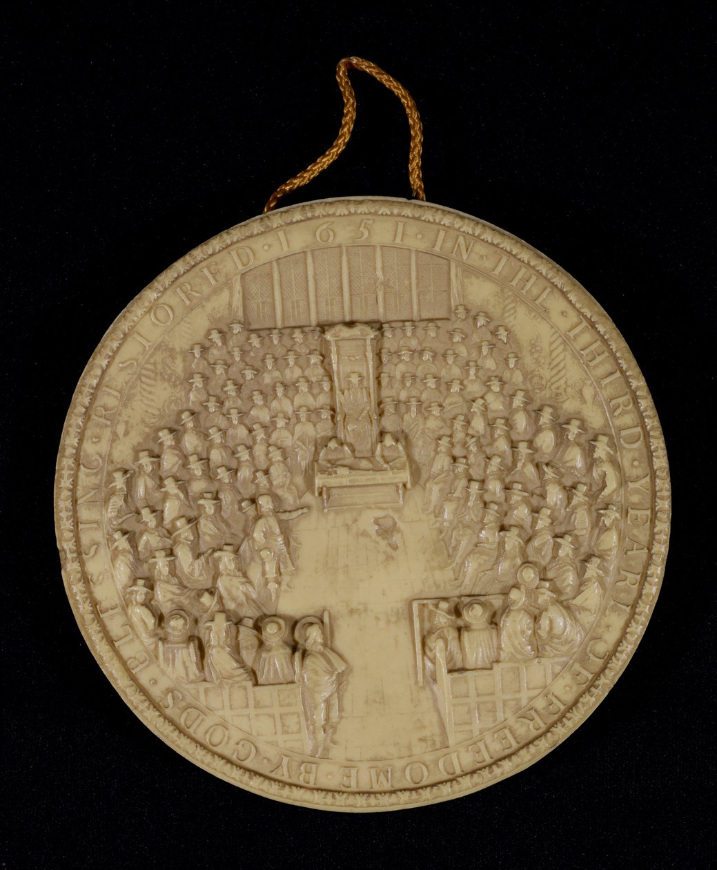 Facsímil del Gran Sello de Inglaterra de 1651, anverso que representa la Cámara de los Comunes en sesión de English School