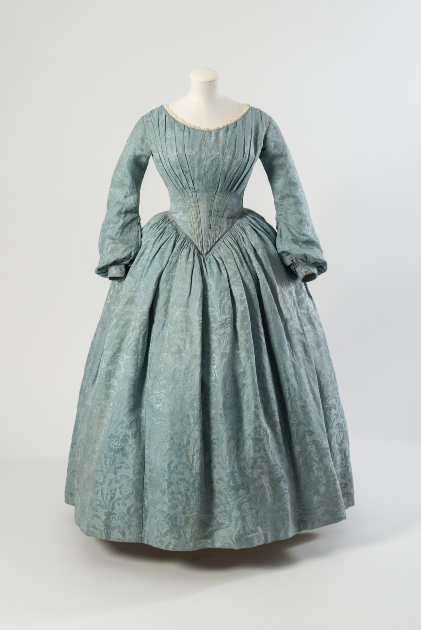 Vestido de seda azul claro con flores, con corpiño en punta y mangas largas de English School