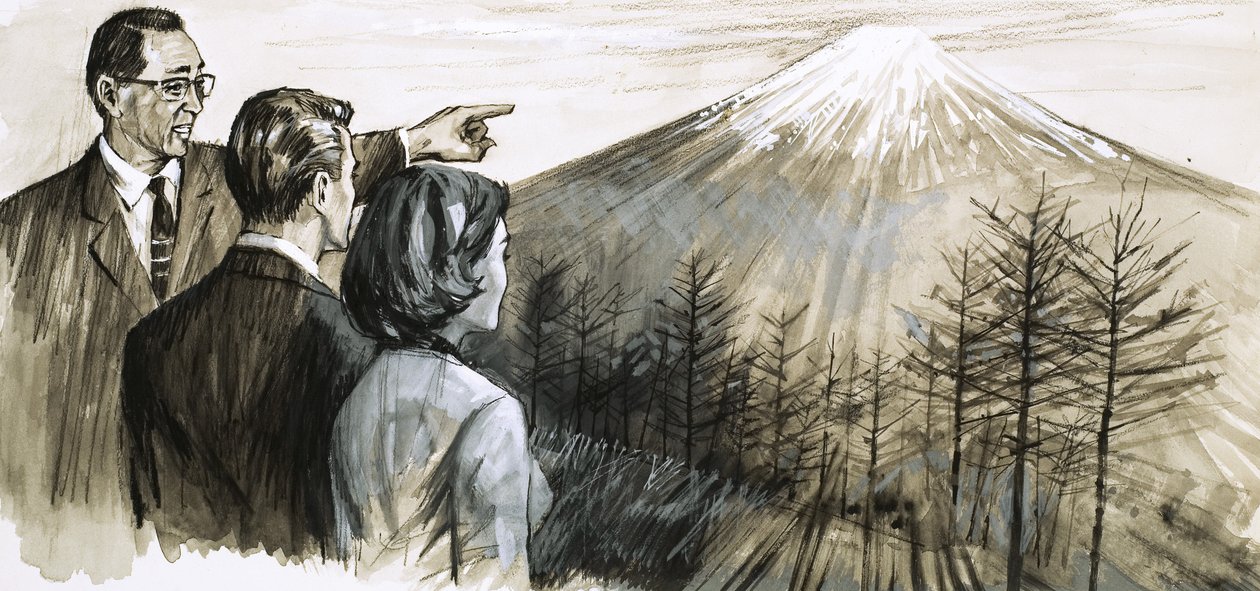 Hombre sin identificar señalando el monte Fuji en Japón de English School