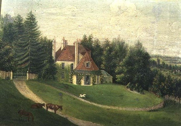 Vista de una casa y un jardín de English School