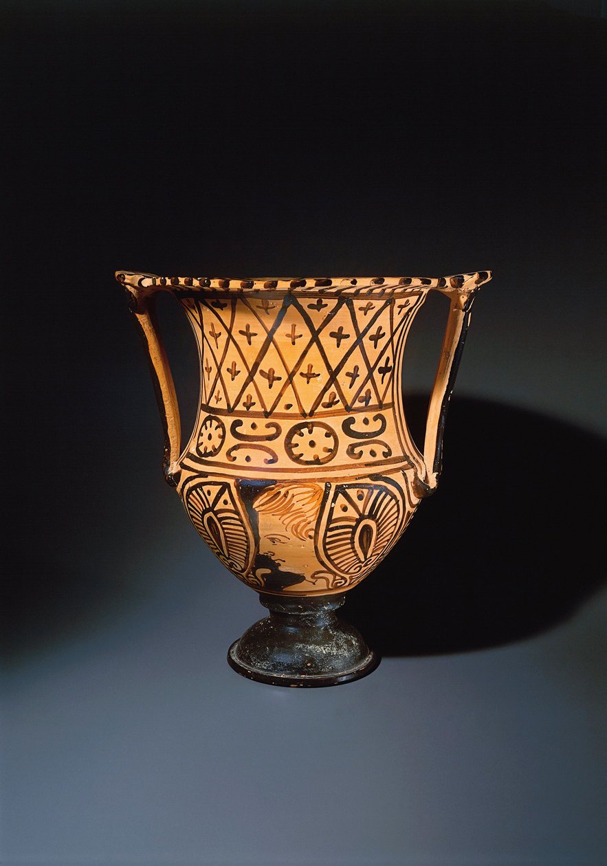 Cáliz-crátera de figuras rojas (jarrón usado para mezclar vino y agua) que representa un rostro humano de Etruscan