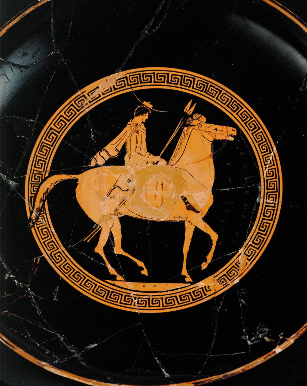 Jinete. Medallón central de una copa de figuras rojas, misma copa que 10-03-03/63 y 64 ... de Euphronios