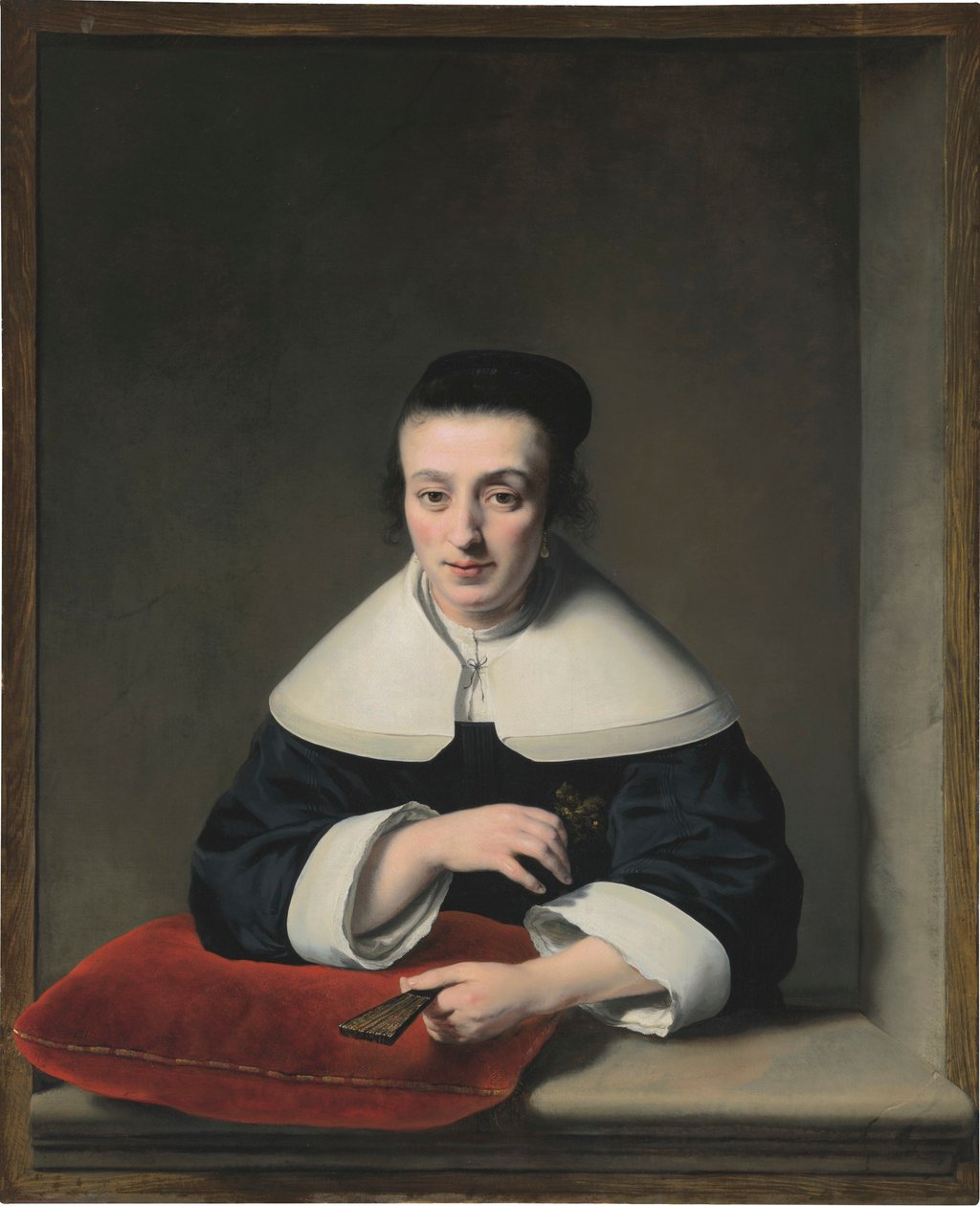 Retrato de una dama junto a una ventana de Ferdinand Bol