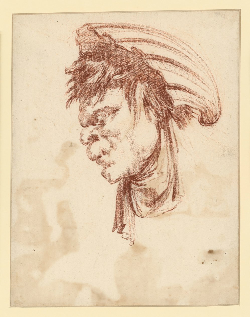 Cabeza grotesca de perfil hacia la izquierda, con una concha a modo de tocado de François Boucher