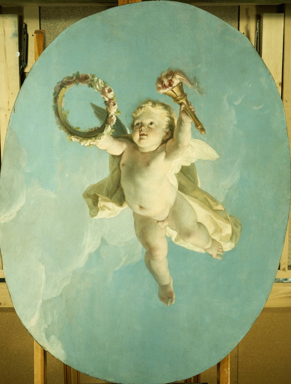 Un putti en vuelo sosteniendo una corona y una antorcha de François Boucher