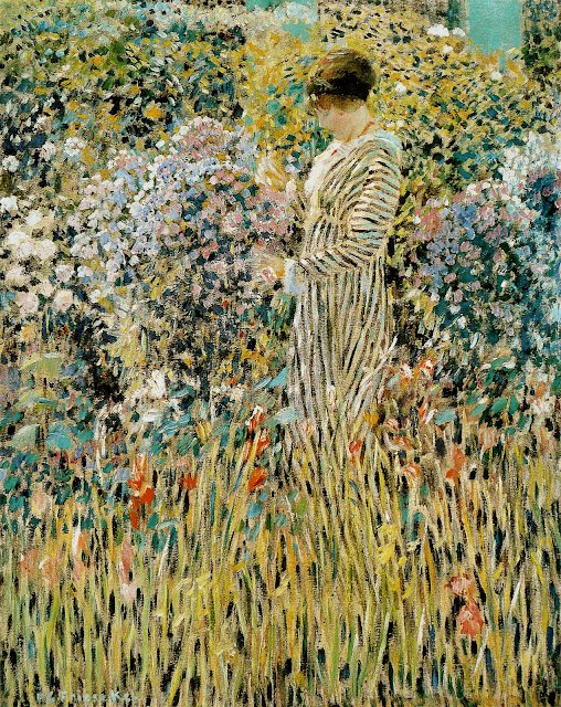 Dama en un jardín de Frederick Carl Frieseke