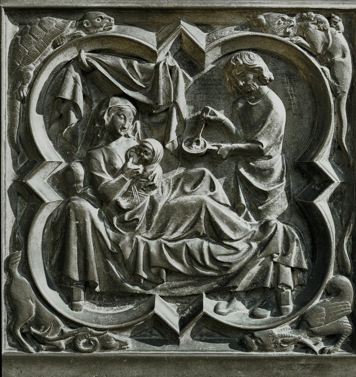 Adán preparando la comida mientras Eva, en la cama, amamanta a un niño ... (relieve) de French School