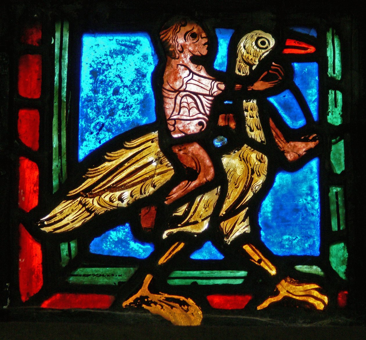 Pieza de esquina de una ventana que representa la parábola del Buen Samaritano: hombre y pájaro de French School