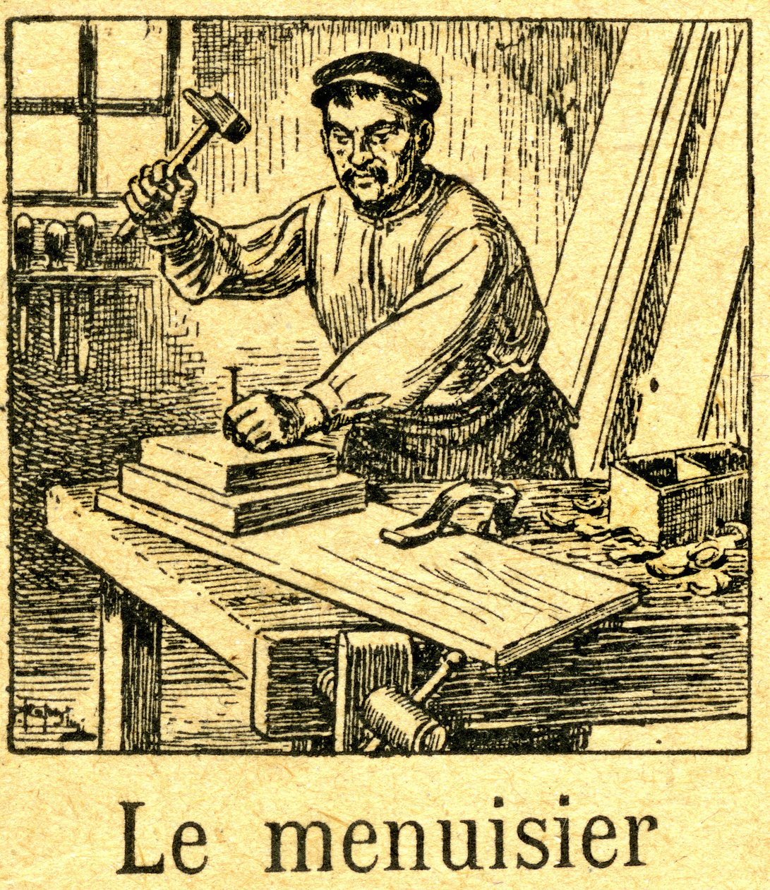 Ebanista plantando una punta (clavo) con un martillo en un conjunto de tablas en su banco. Grabado de un silabario (libro de lectura) hacia 1920. de French School