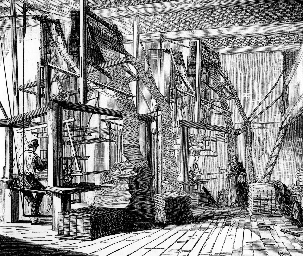 Trabajadores de la seda en un taller en Lyon usando un telar Jacquard, c.1880 de French School
