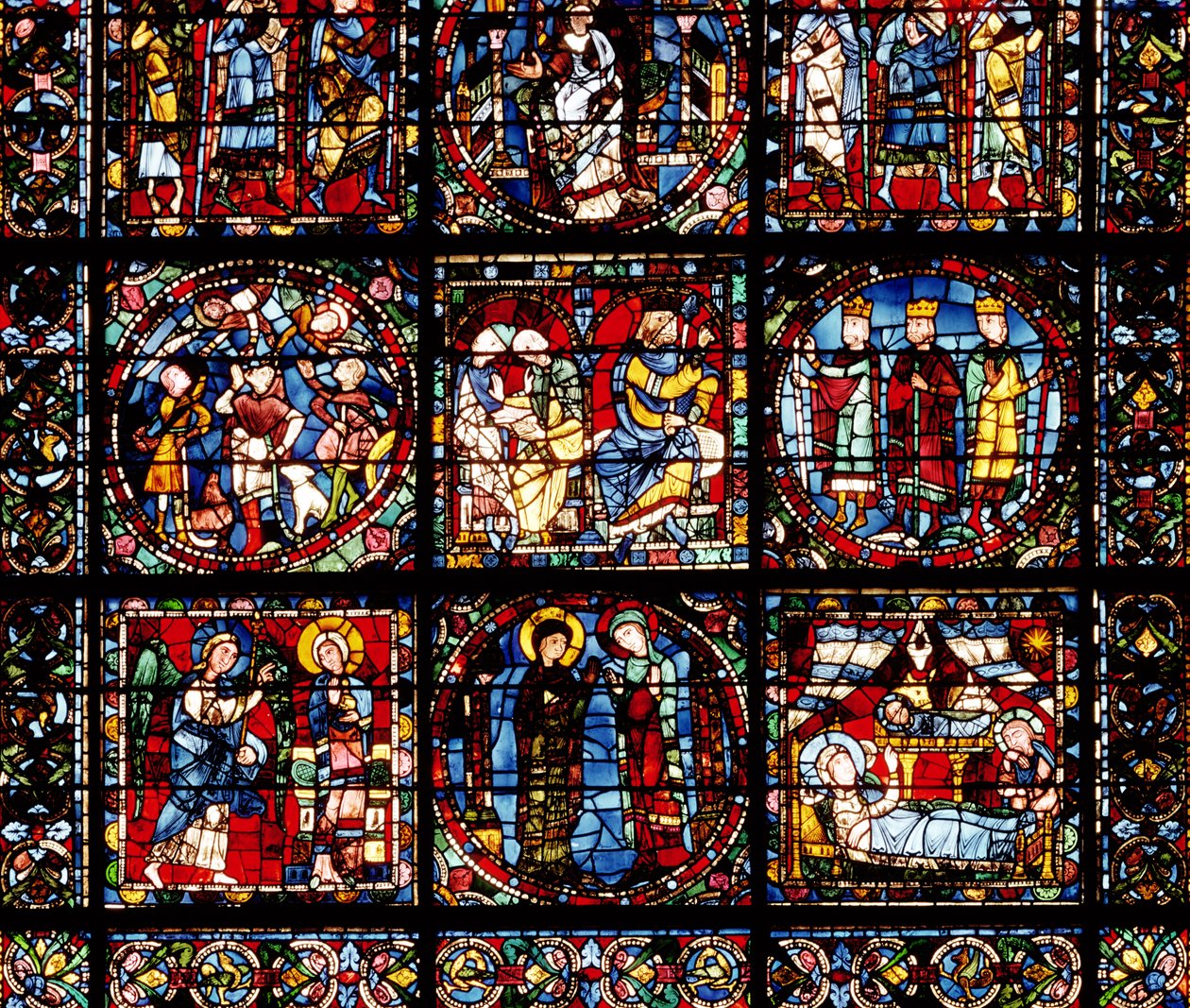 La ventana de la Encarnación, (detalle) de la parte inferior que representa la Anunciación, la Visitación, la Natividad, la Anunciación a los pastores y los Magos ante Herodes de French School