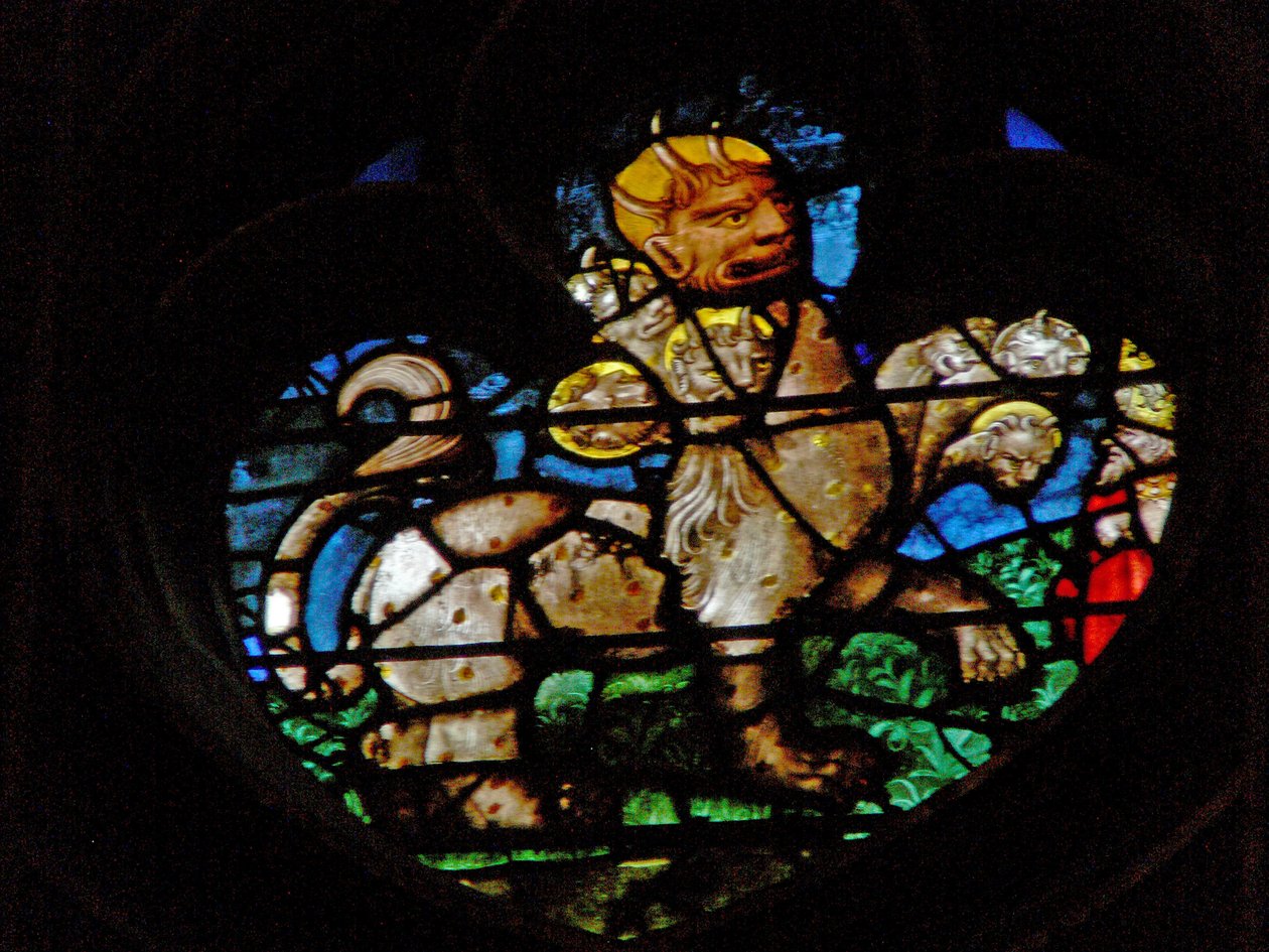 La ventana rosa oeste que representa una escena del Libro del Apocalipsis: Bestia de French School