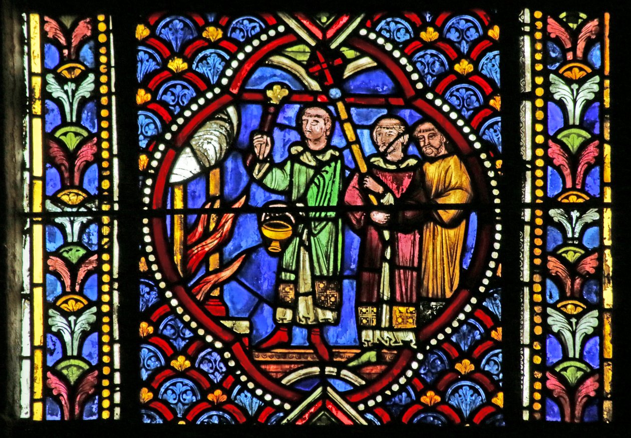 Vidriera que representa una escena de la vida de San Artheme: Un incendio en la ciudad de Clermont requiere el traslado de las reliquias del santo. Una procesión lleva el relicario y llega al incendio de French School