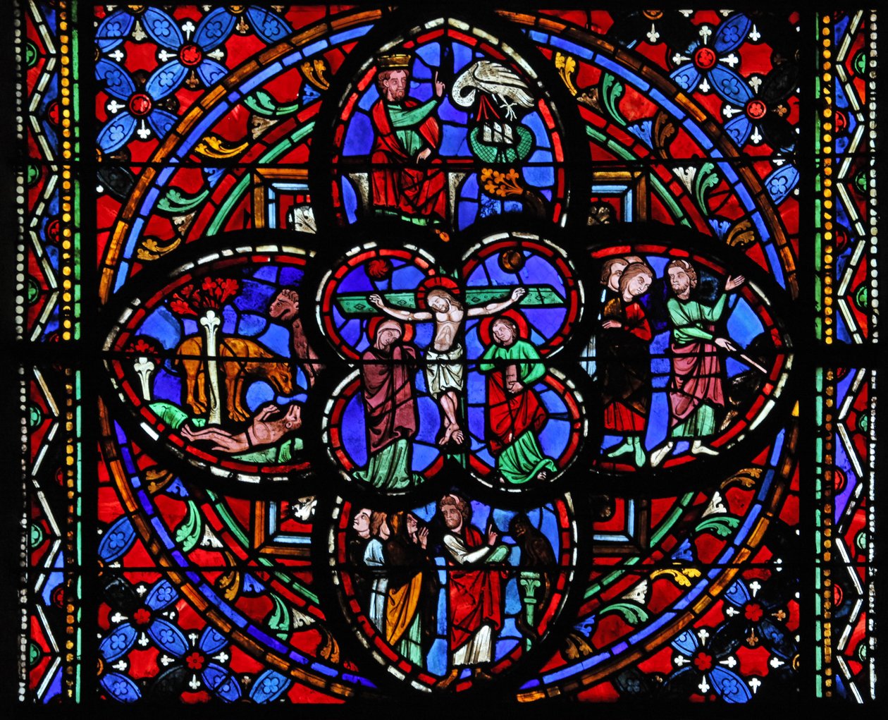 Ventana que representa la tercera sección de la ventana w0 con la Crucifixión: también Moisés golpea la roca en Horeb; la serpiente de bronce; un león revive a sus crías; David y el pelícano de French School