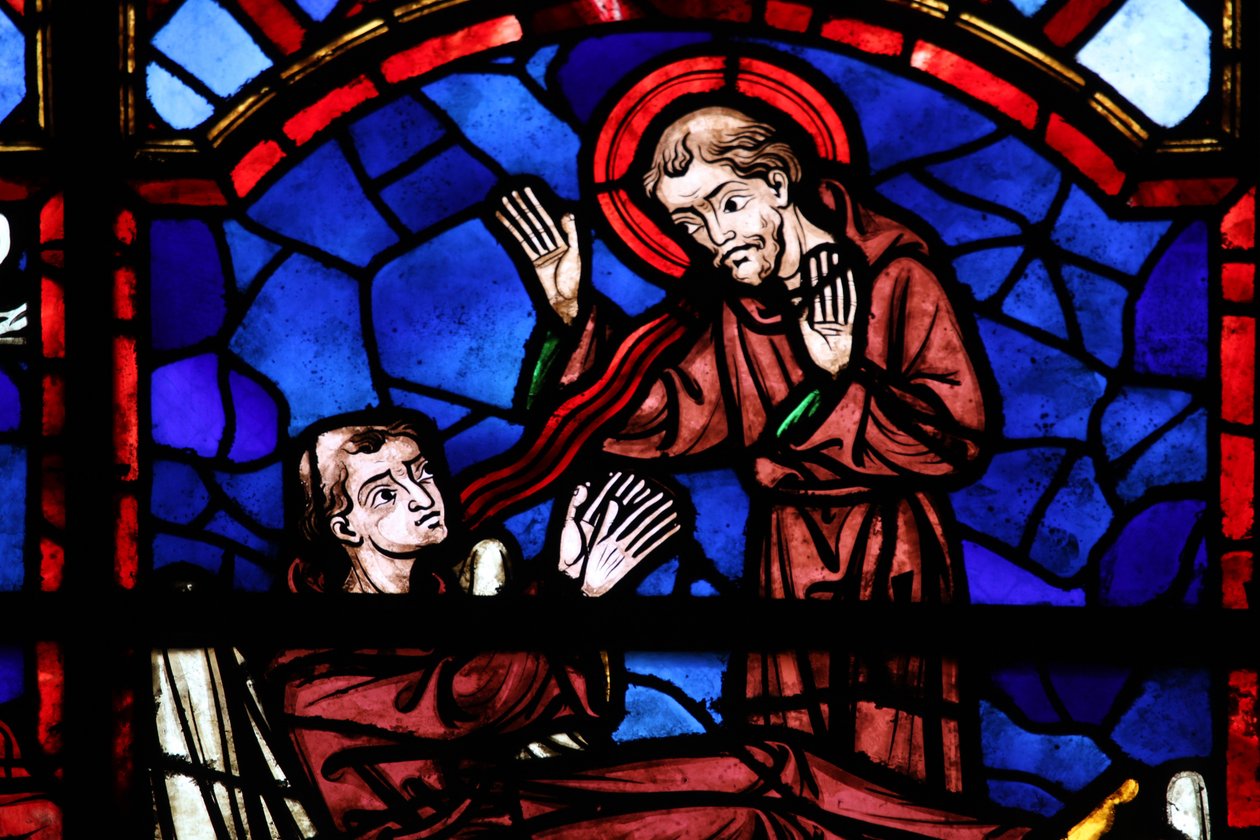 Ventana w04 que representa a un monje santo apareciendo a San Martín de French School