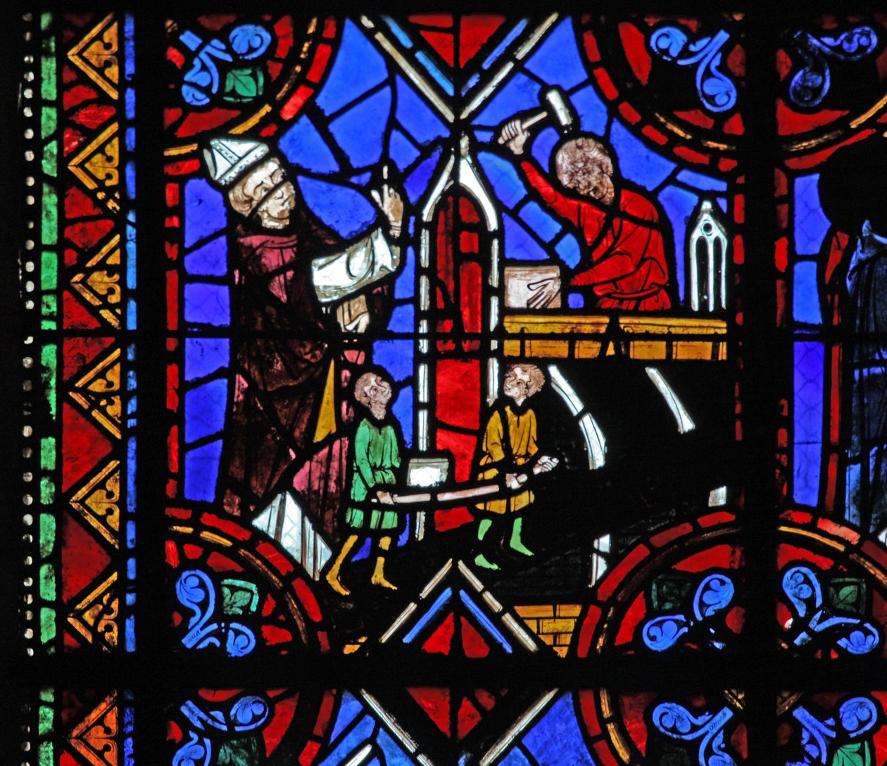 Ventana w06 que representa la construcción de una iglesia de French School