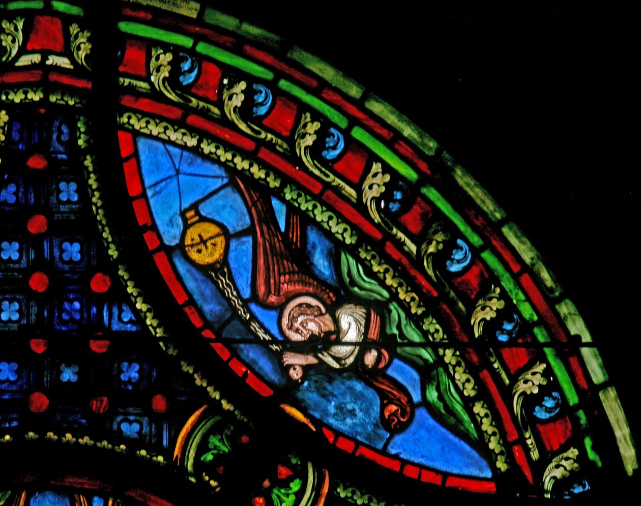 Ventana w0 que representa un ángel de French School