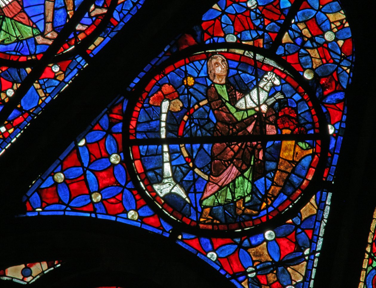 Ventana w115 que representa a Abel llevando un cordero para el sacrificio de French School