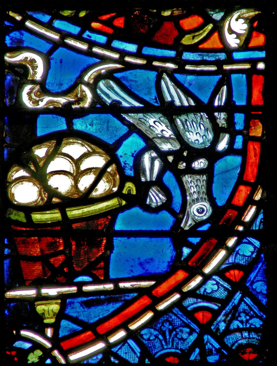 Ventana w11 que representa a un pájaro que viene a comer del cesto del panadero de French School