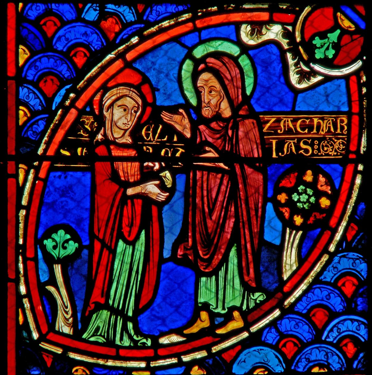 Ventana w20 que representa a Zacarías y Isabel, los padres de San Juan Bautista de French School