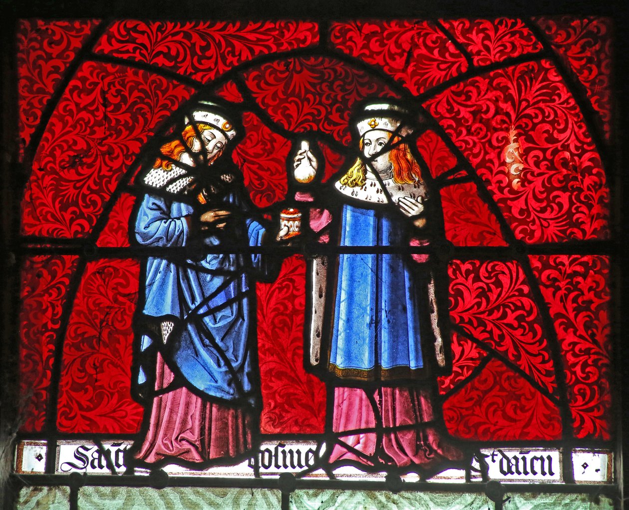 Ventana w22 que representa a San Cosme y San Damián de French School