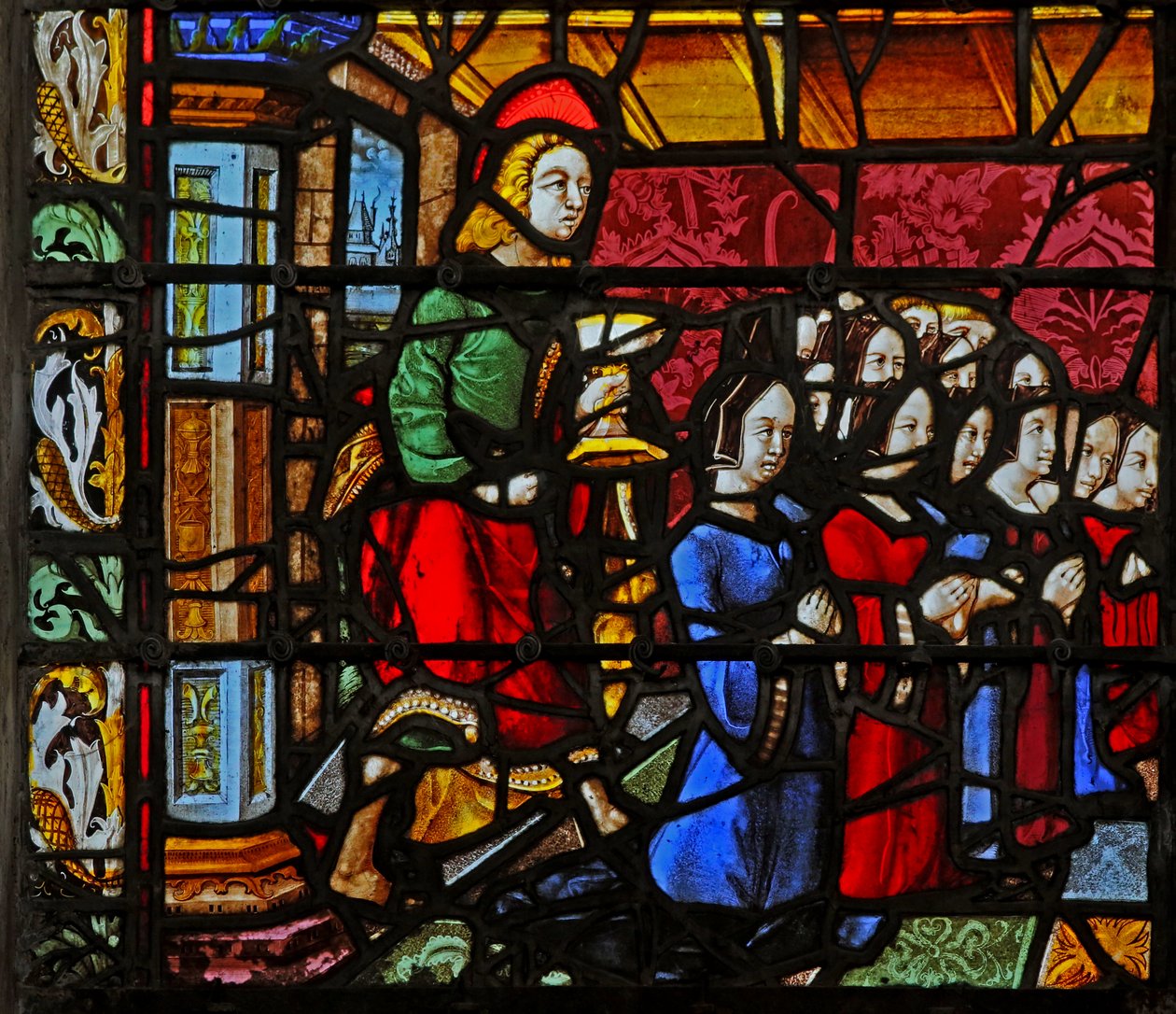 Ventana w2 que representa a San Juan con los donantes y (¡muchas!) hijas de French School