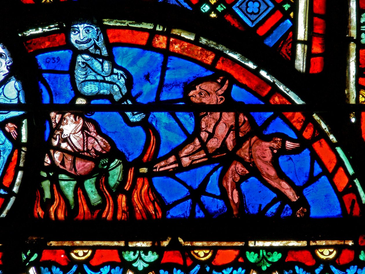 Ventana w4 que representa a un impenitente siendo atormentado por demonios de French School
