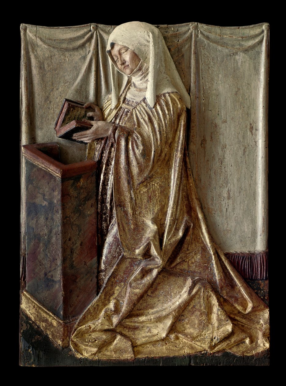 Donante arrodillado. Fragmento de un retablo tallado en madera policromada. De Suabia. c.1520. París, Museo del Louvre de German School