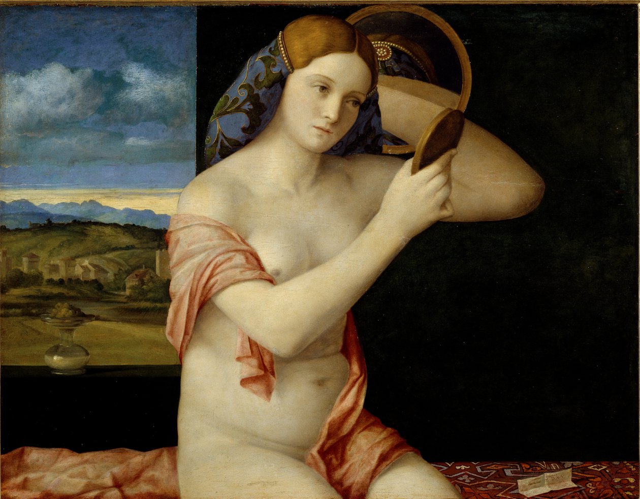 Mujer joven en su aseo de Giovanni Bellini