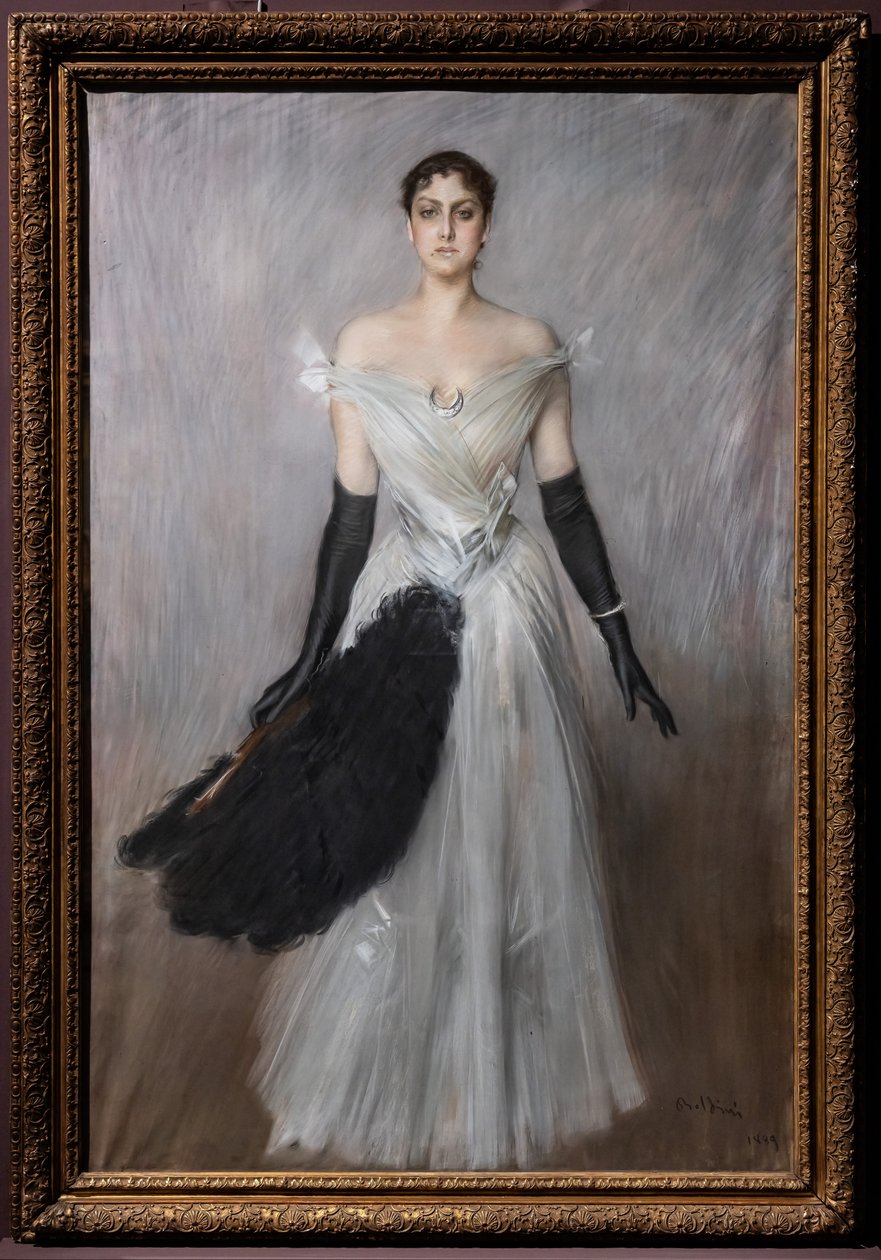 Retrato de una dama de blanco con guantes y abanico de Giovanni Boldini
