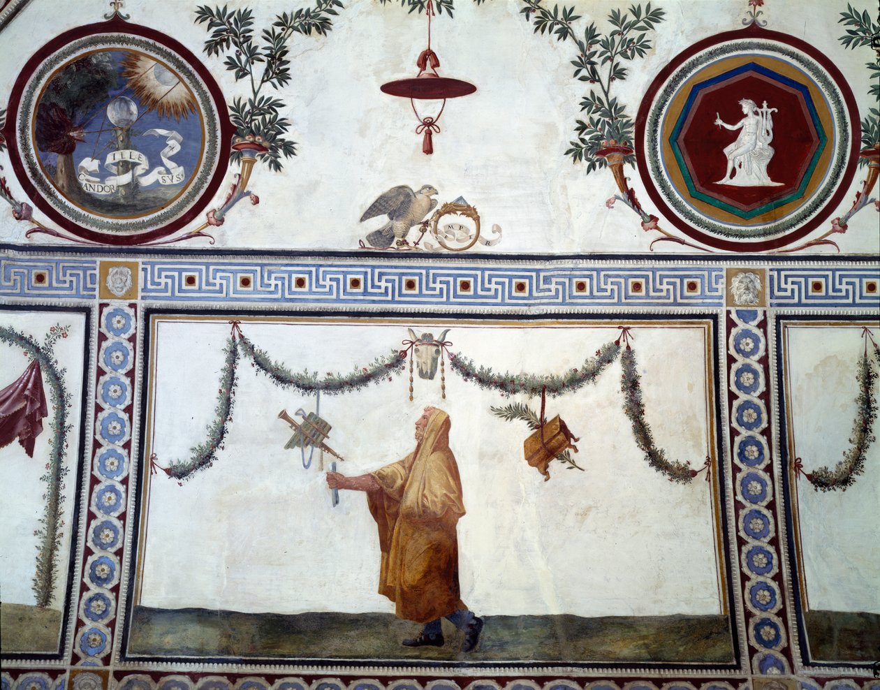 La Cámara con Friso de Amorini (detalle del techo con un hombre con túnica y emblema de la familia Medici) de Giulio Romano