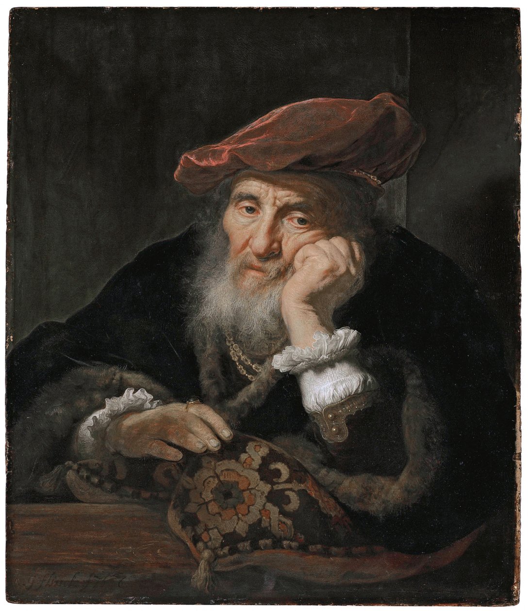Un anciano ante una ventana de Govert Flinck