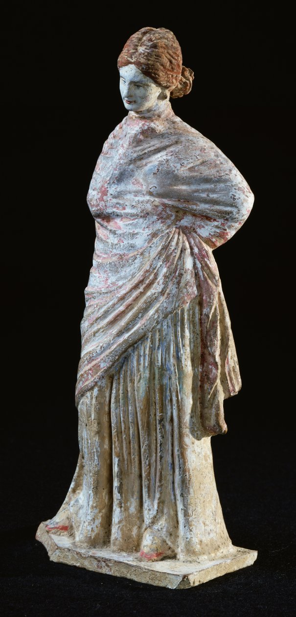 Estatuilla de una mujer con ropa drapeada, de Tanagra, Beocia de Greek