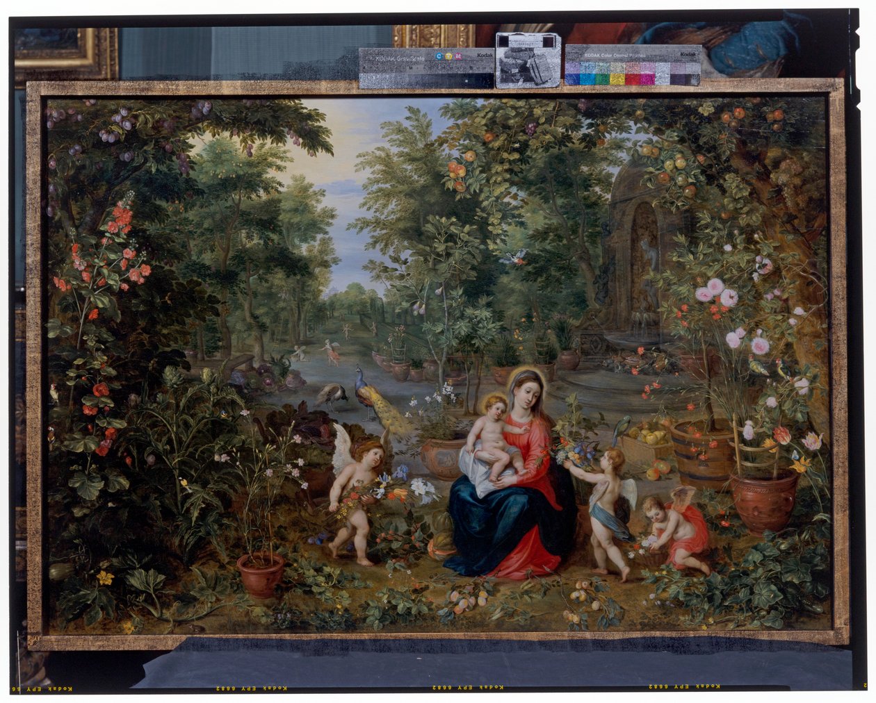 La Virgen y el Niño sentados en un jardín con putti, pájaros y animales de Hendrik van the Elder Balen