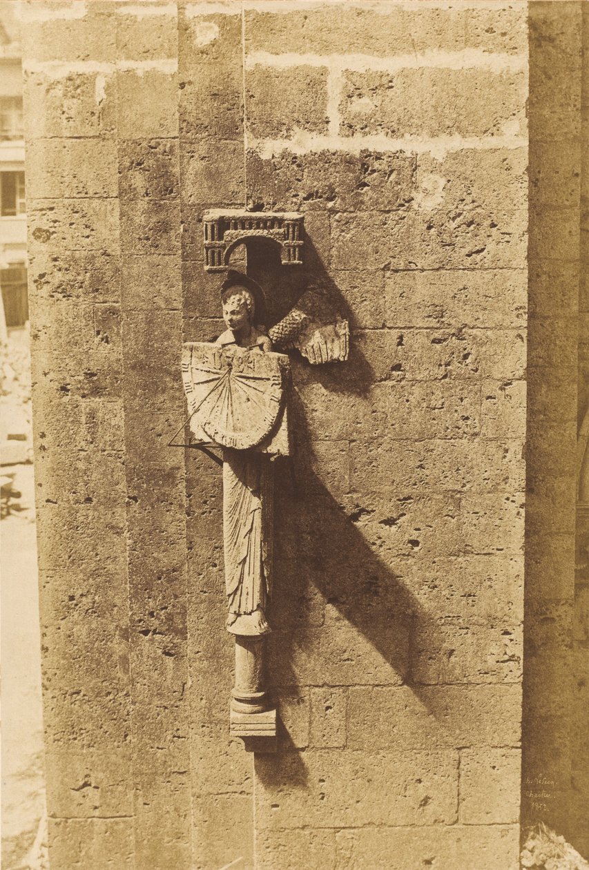 Ángel portando un reloj de sol, en la iglesia de Chartres de Henri Le Secq