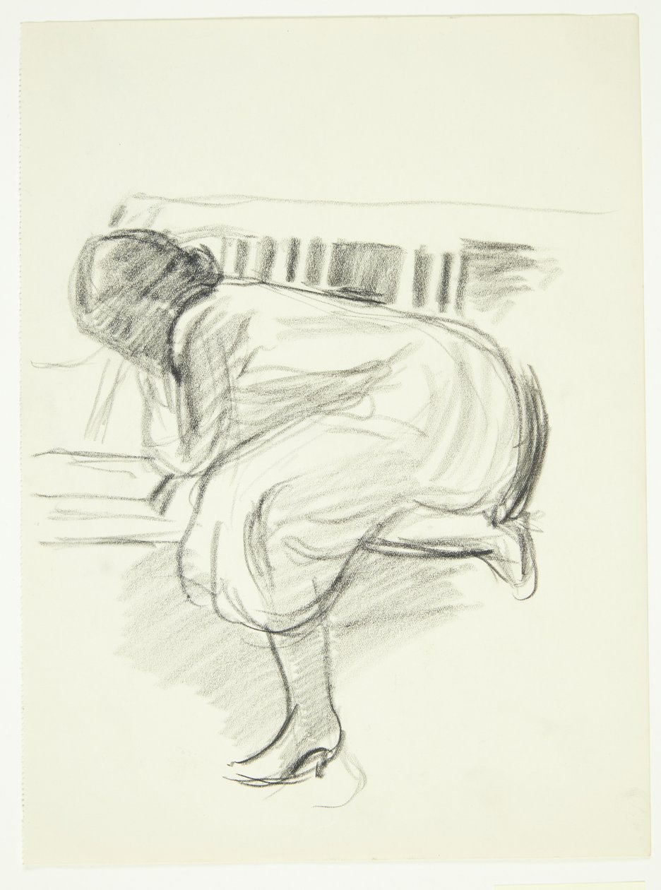Mujer leyendo acurrucada en un sofá de Henrik Schouboe