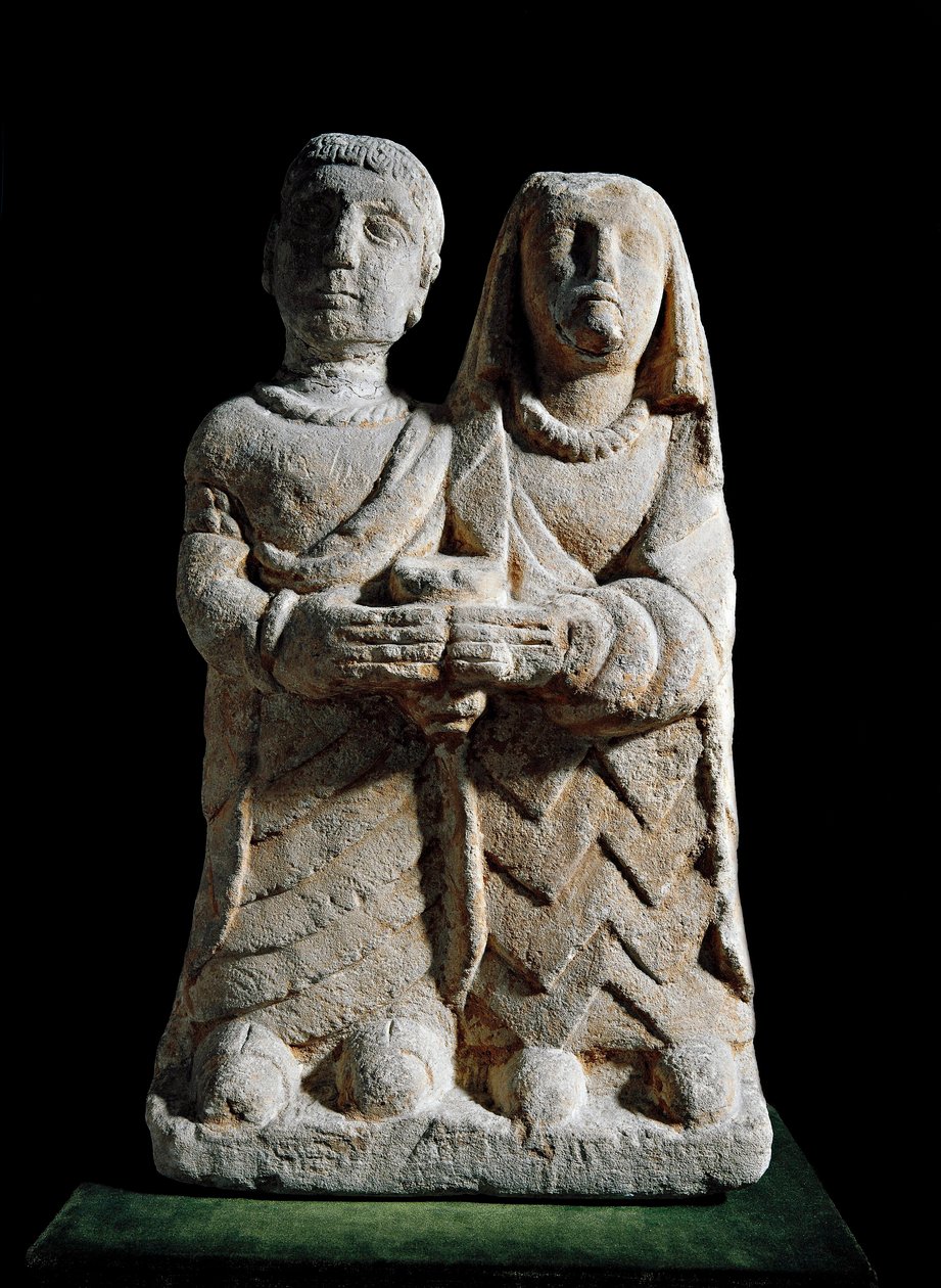 Arte ibérico: estatuilla de una pareja haciendo una ofrenda. Escultura de Albacete, Cerro de los Santos, España. Siglo IV-II a.C. Madrid, Museo Arqueológico Nacional de Iberian