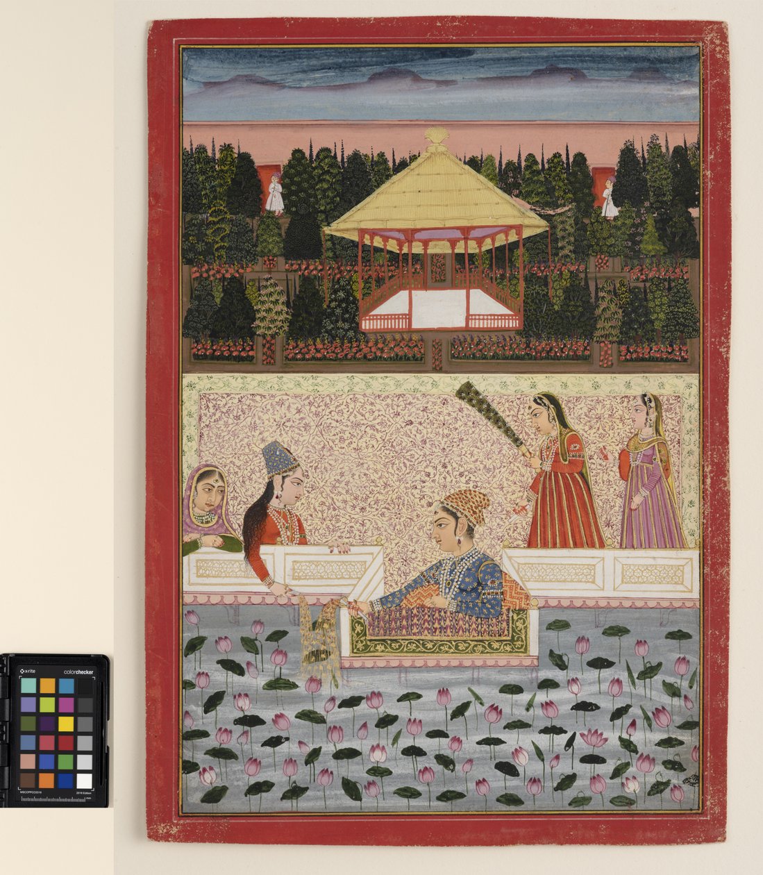 Un príncipe y una princesa juegan con bengalas junto a un estanque de lotos, c.1760 de Indian School