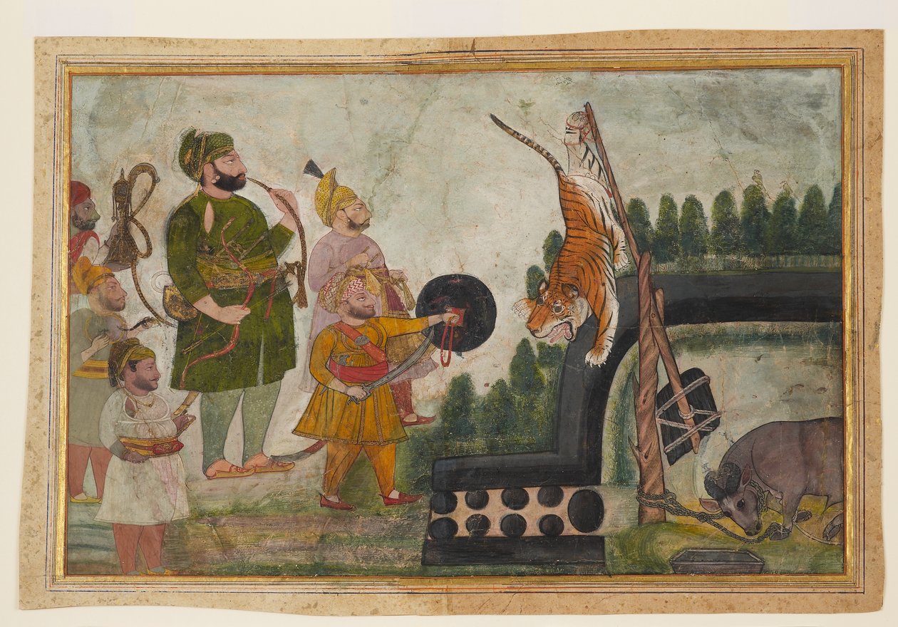 Rawat Gokul Das inspecciona un tigre atrapado de Indian School