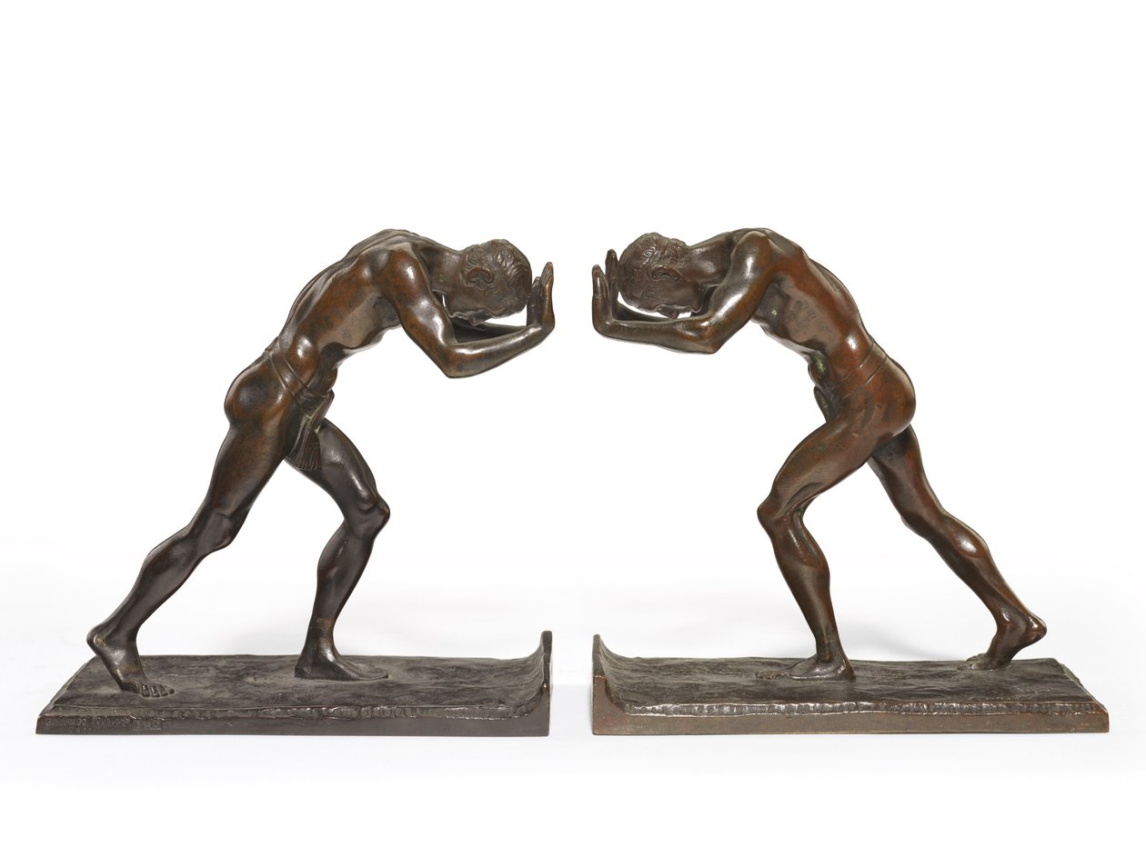 Hombres empujando, un par de sujetalibros de Isidore Konti
