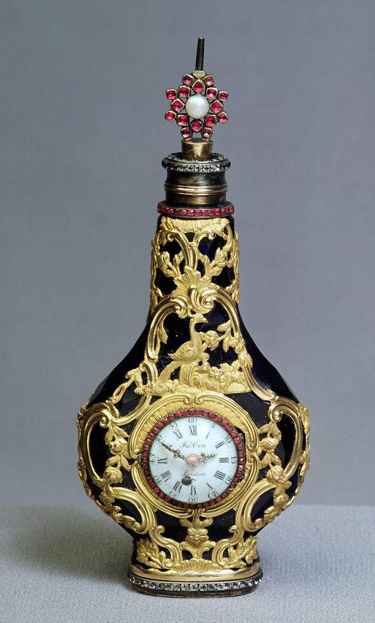 Frasco de perfume con reloj y brújula de James Cox