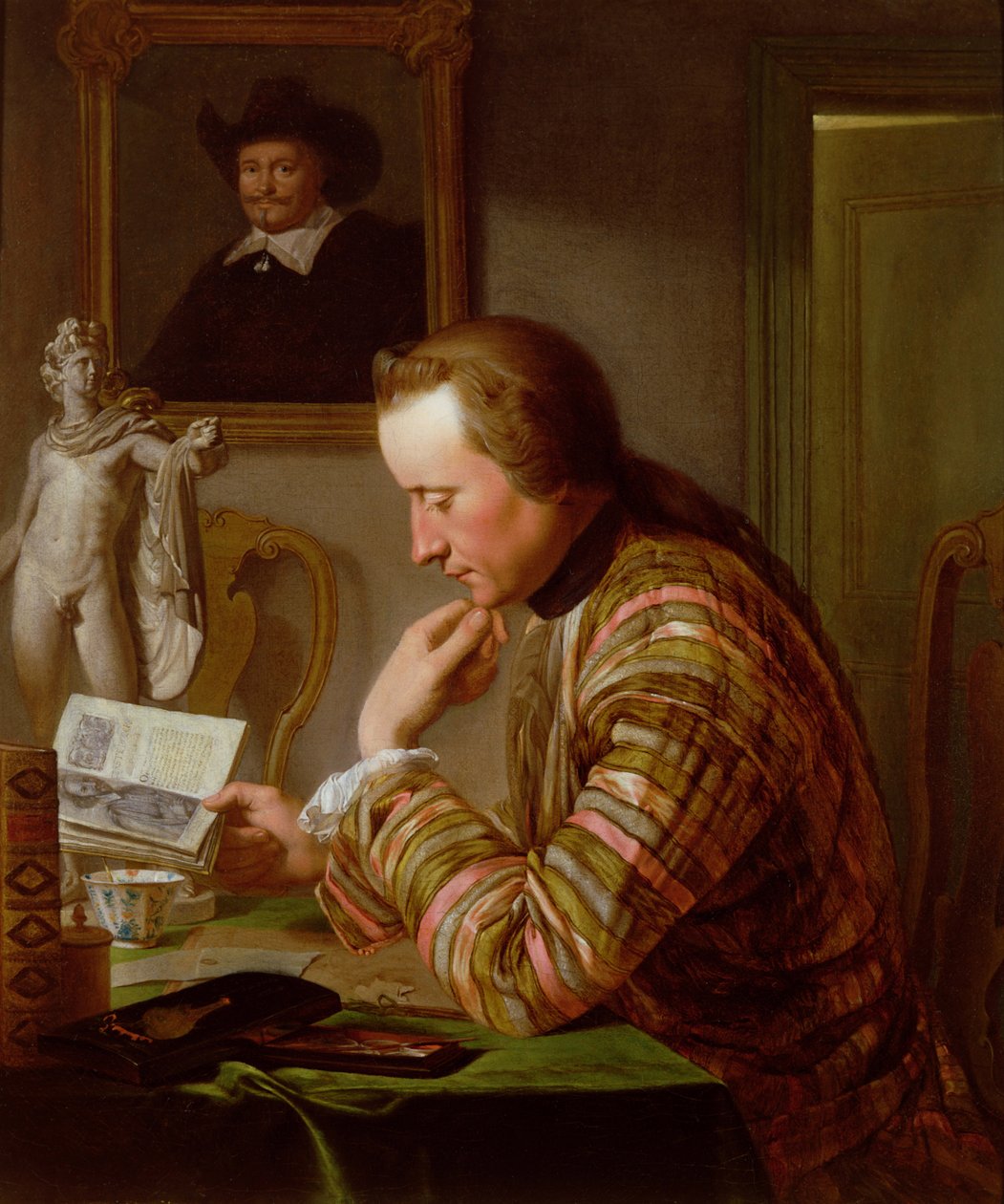 Caballero Leyendo en una Mesa a la Luz de las Velas de Jan Maurits Quinckhardt