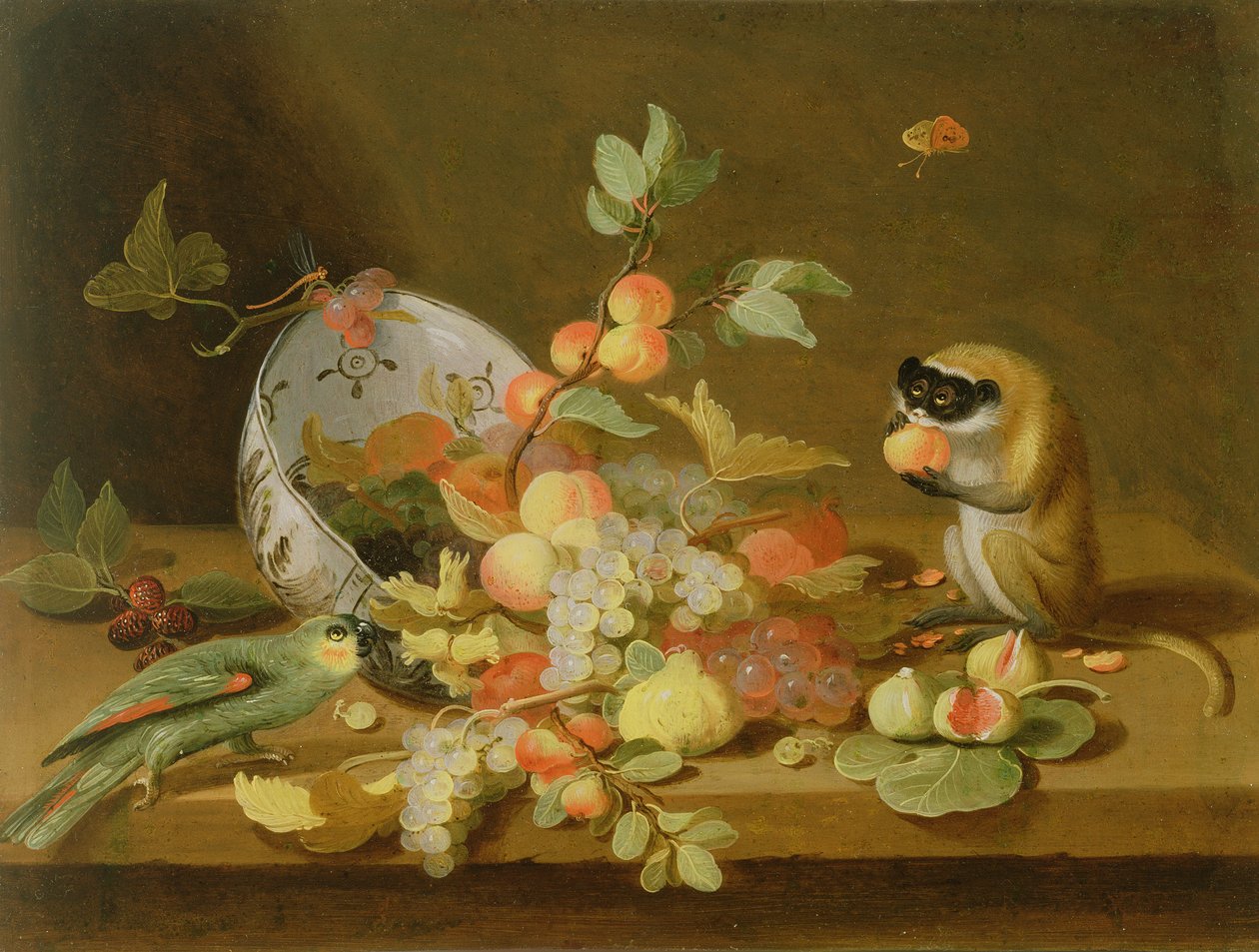 Uvas y duraznos derramándose de un cuenco de Delft volcado de Jan van Kessel the Elder