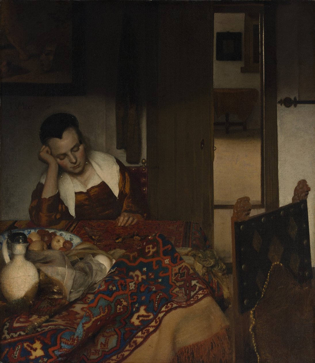 Niña dormida en una mesa de Johannes Vermeer