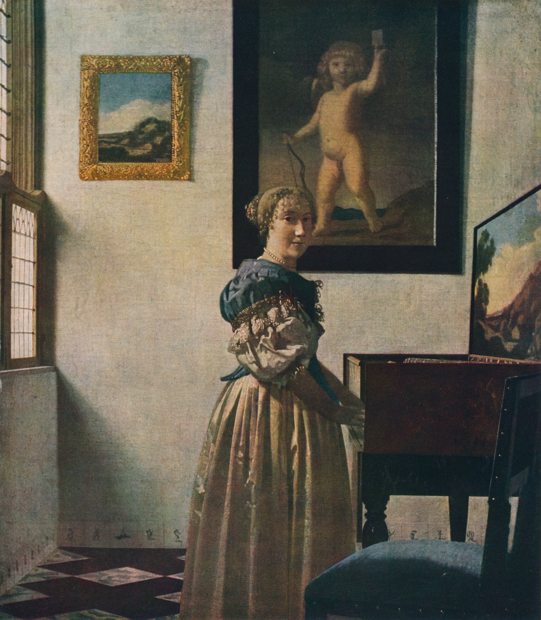 Una Joven de Pie en un Virginal, alrededor de 1670-1672 de Jan Vermeer van Delft